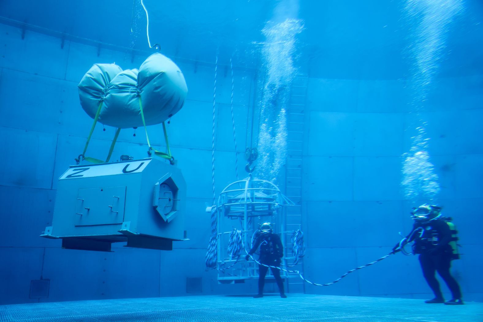 Taiwanese navy divers simulate an underwater rescue as part of a combat readiness exercise in Kaohsiung, Taiwan, on Thursday, January 9.