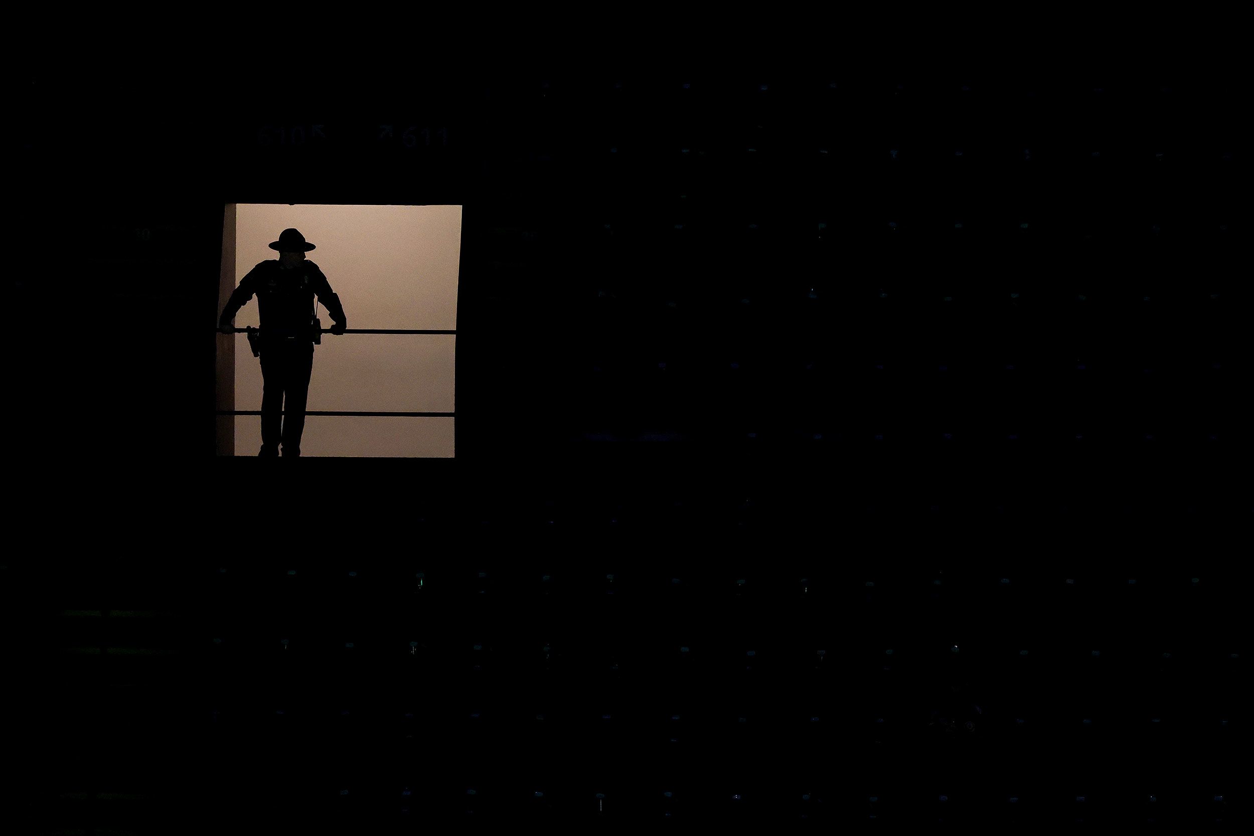 A police officer is seen at the Superdome on Sunday.