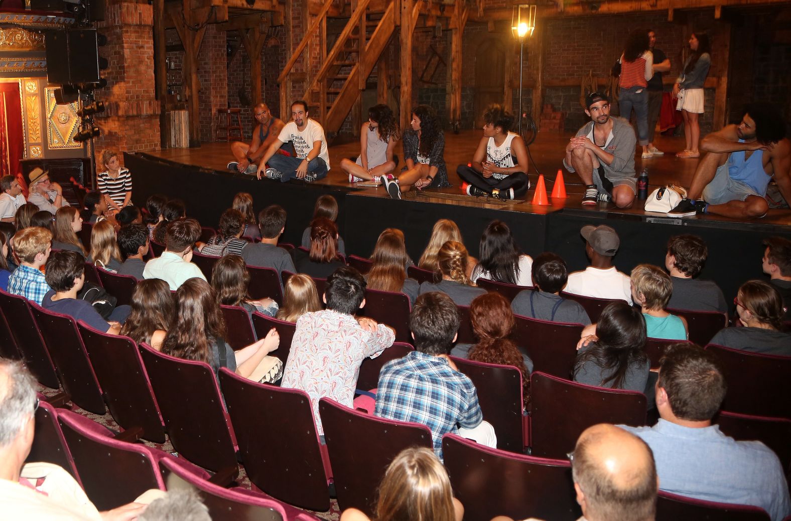 Cast members talk to performing arts students in August 2015.