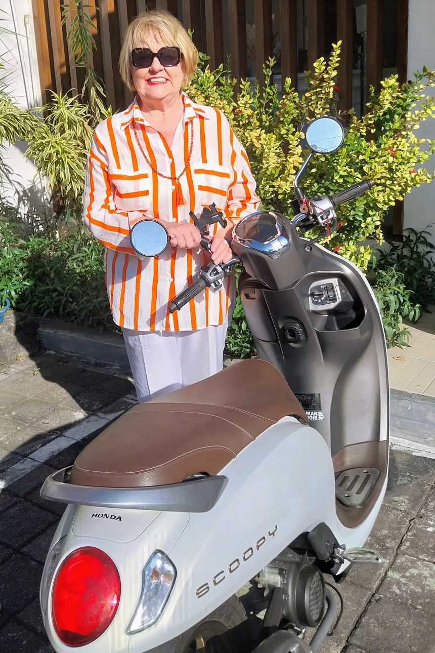 Victoria rides around Bali on her scooter. 