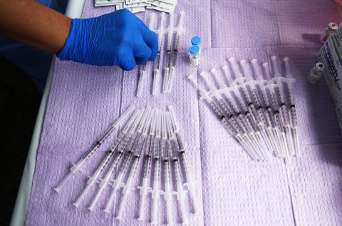 Doses of the Johnson & Johnson Covid-19 vaccine are prepared at a clinic in Los Angeles on March 25.