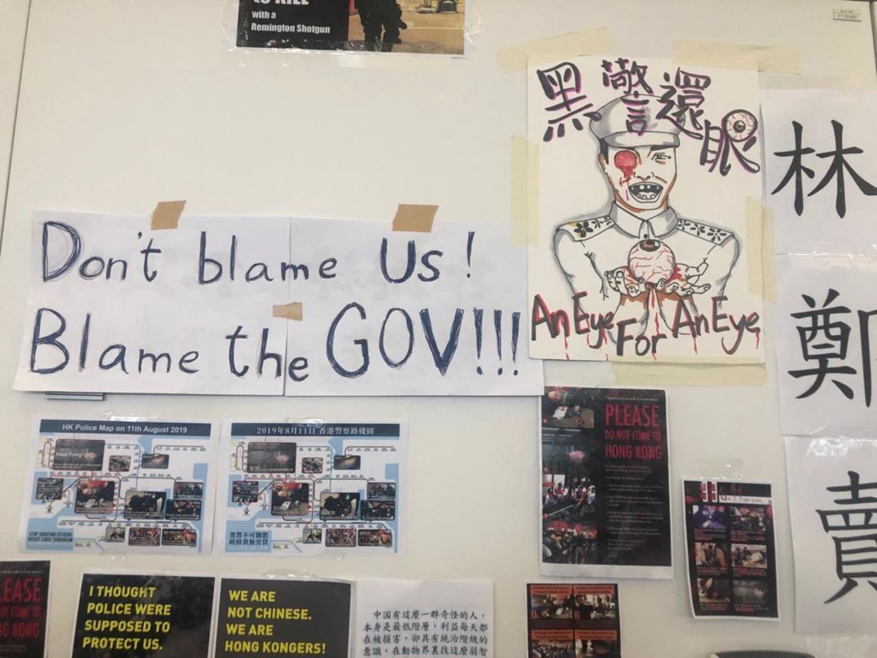 Flyers at the airport, where many international tourists are now trapped alongside thousands of protesters.