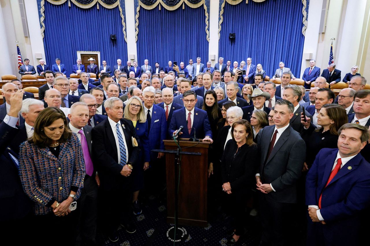 Rep. Mike Johnson is surrounded by fellow members as he speaks to reporters after securing the nomination for House Speaker from the Republican conference on Capitol Hill in Washington, DC, on October 24. 