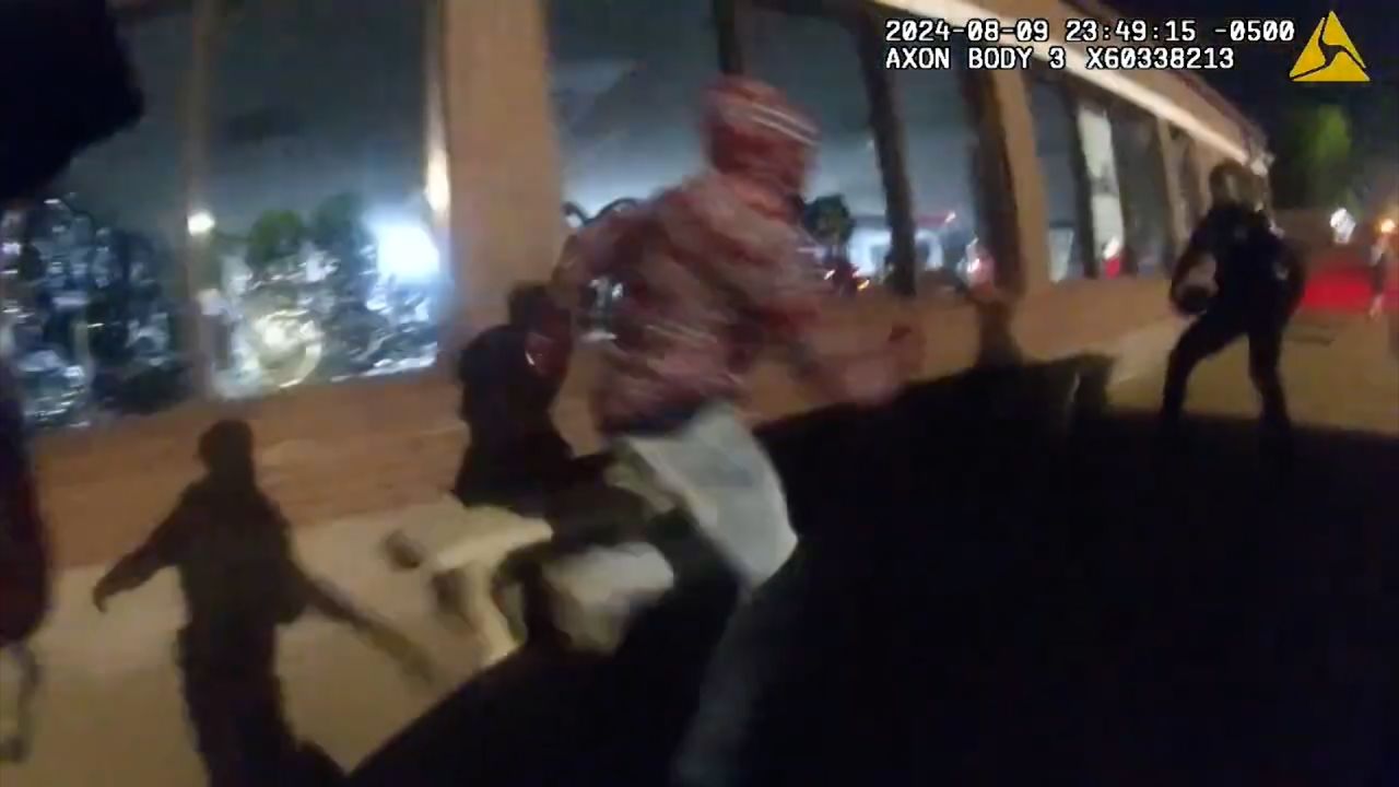 Ferguson Police Release Videos Showing Officer Pushed To Sidewalk During Protests Marking 10 5238