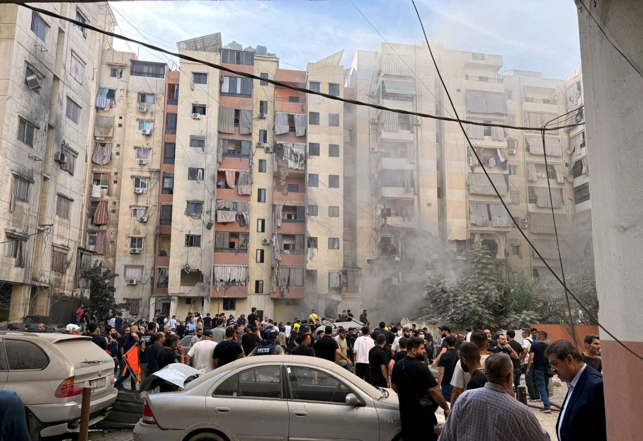 People inspect the site of an Israeli strike in the southern suburbs of?Beirut, Lebanon, on September 20.