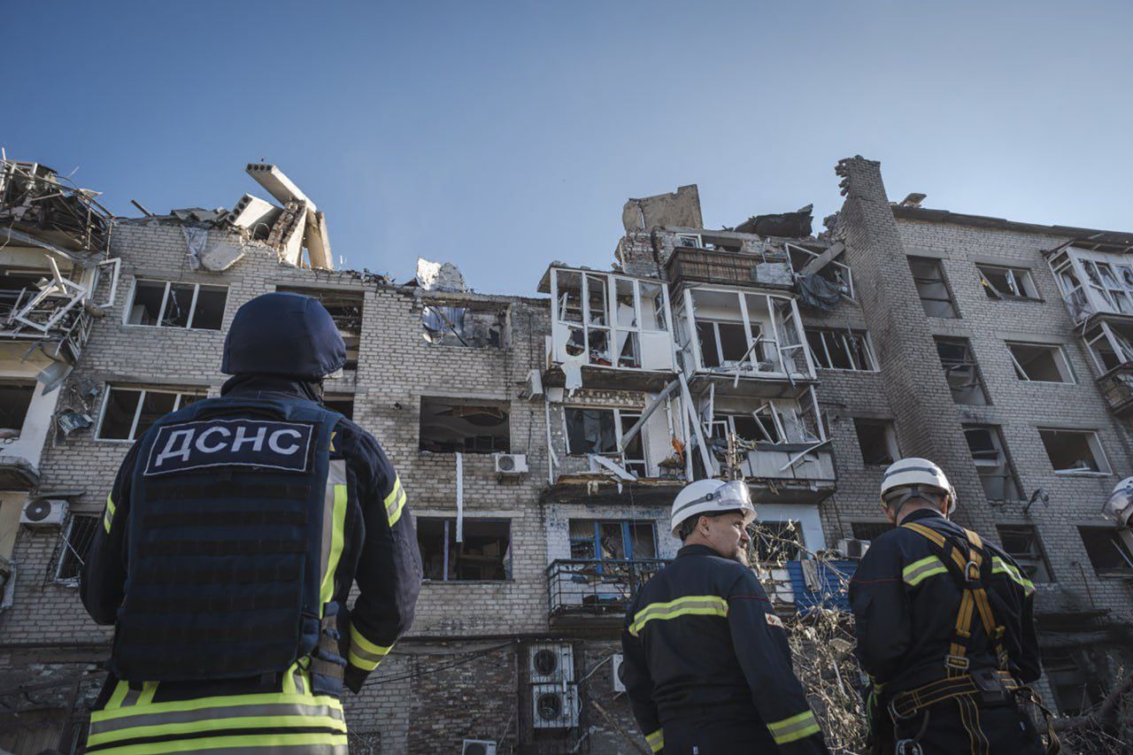 The Ukrainian Emergency Service rescuers work on the scene of a building damaged after Russian missile strikes in Pokrovsk, Donetsk region, Ukraine, on August 8.