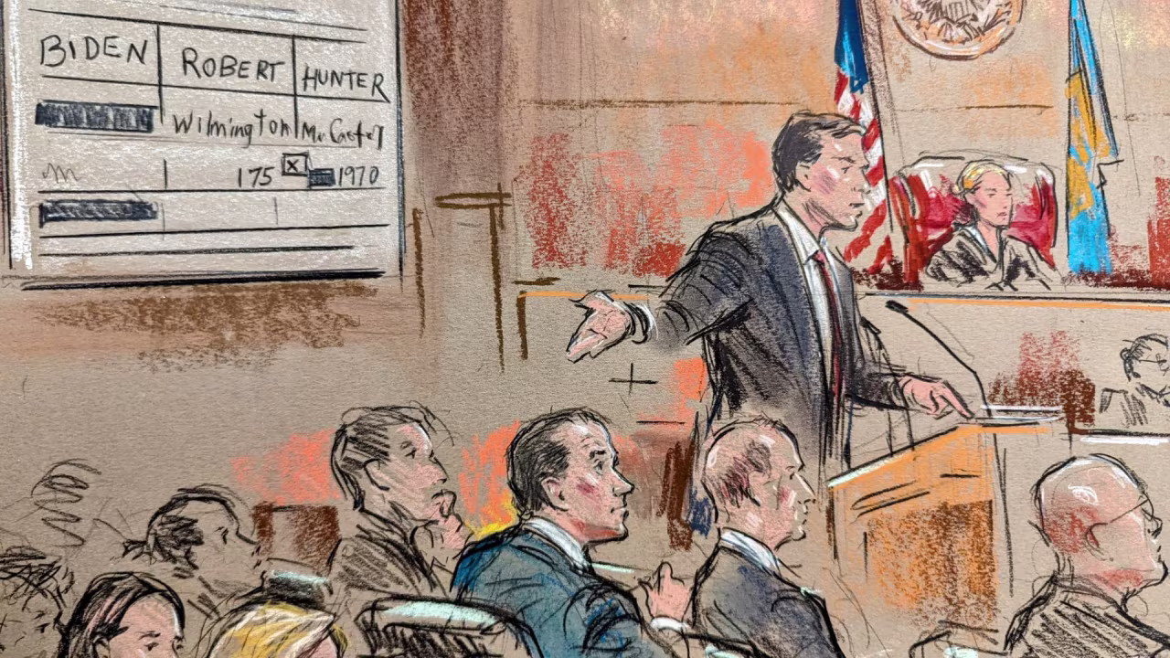 US Department of Justice attorney Derek Hines gestures toward Hunter Biden in court.