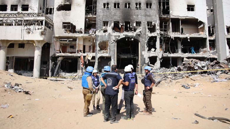 A United Nations team inspects the grounds of Al-Shifa hospital after an Israeli raid on April 8.