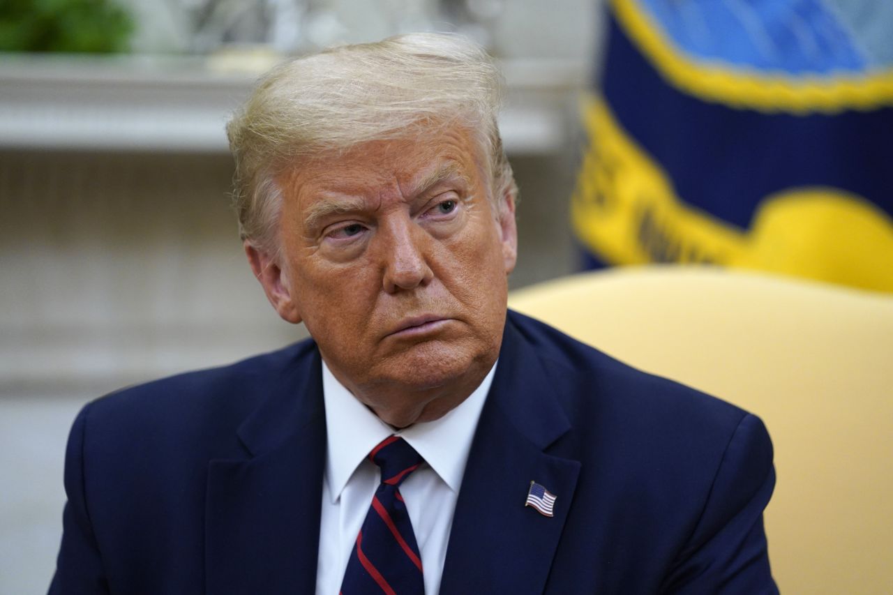 President Donald Trump attends a meeting at the White House on July 30.