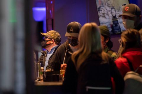People stand in Valhalla Esports Lounge on March 2 in Austin, Texas.