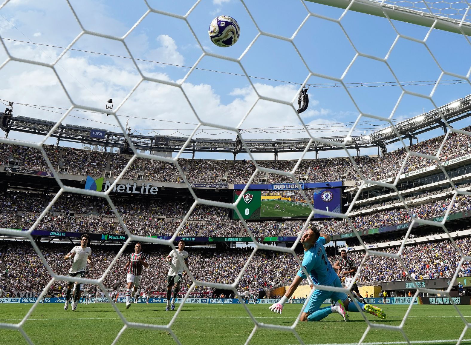 Fluminense goalkeeper Fabio watches the ball sail into his net during the <a href="index.php?page=&url=https%3A%2F%2Fwww.cnn.com%2F2025%2F07%2F09%2Fsport%2Fjoao-pedro-chelsea-fluminense-club-world-cup-spt">Club World Cup loss to Chelsea</a> on Tuesday, July 8. Chelsea will play PSG in Sunday’s final.