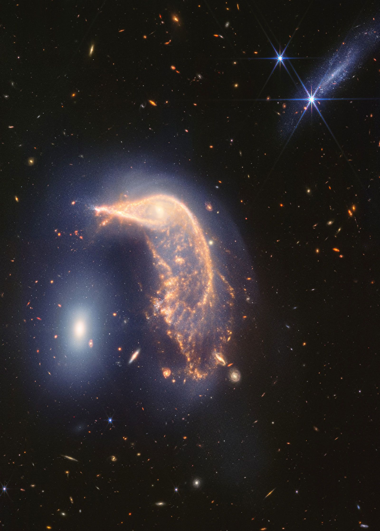 To mark the two-year anniversary of the James Webb Space Telescope, NASA released this stunning new image Friday, July 12, that shows two galaxies, nicknamed the Penguin and the Egg, <a href="https://www.cnn.com/2024/07/12/science/webb-telescope-penguin-egg-galaxies-image/index.html">locked in a cosmic dance</a>.