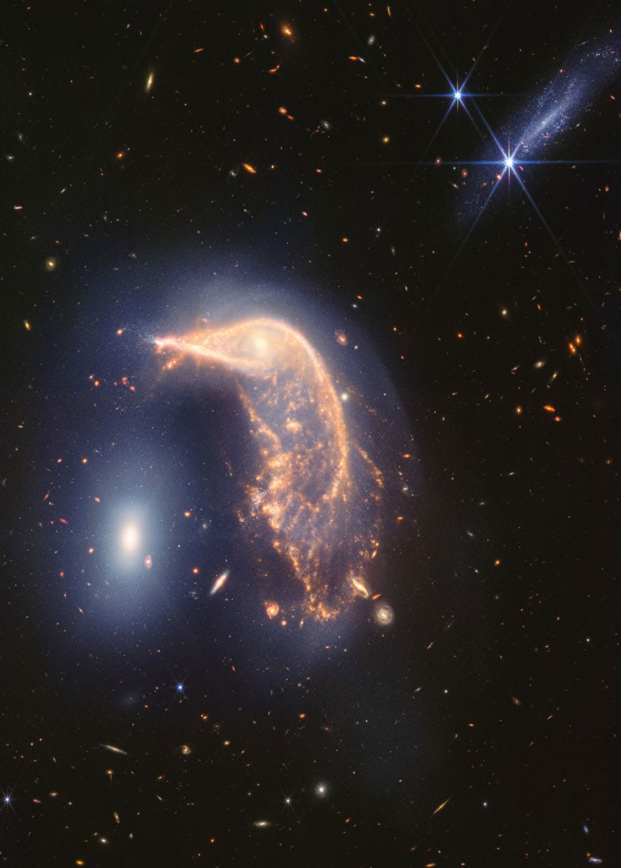 To mark the two-year anniversary of the James Webb Space Telescope, NASA released this stunning new image Friday, July 12, that shows two galaxies, nicknamed the Penguin and the Egg, <a href="index.php?page=&url=https%3A%2F%2Fwww.cnn.com%2F2024%2F07%2F12%2Fscience%2Fwebb-telescope-penguin-egg-galaxies-image%2Findex.html">locked in a cosmic dance</a>.