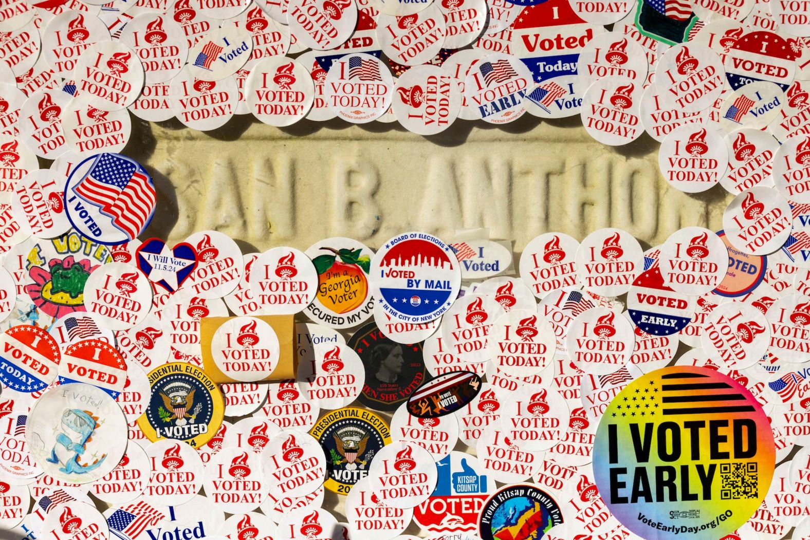 The headstone of women's suffragist Susan B. Anthony is covered in "I voted" stickers at the Mount Hope Cemetery in Rochester, New York, on Tuesday, November 5.