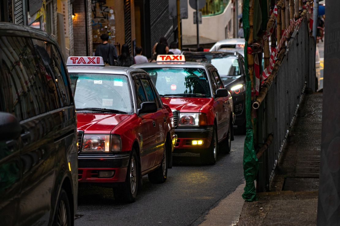 Taxis sit in a traffic jam in Hong Kong, China, on May 24, 2024.