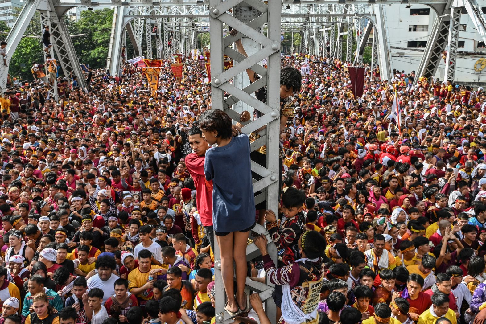 Catholic devotees attend the <a href="index.php?page=&url=https%3A%2F%2Fwww.cnn.com%2F2024%2F01%2F10%2Fasia%2Fphilippine-black-nazarene-traslacion-intl-hnk%2Findex.html">annual procession of the Black Nazarene</a> in Manila, Philippines, on Thursday, January 9.