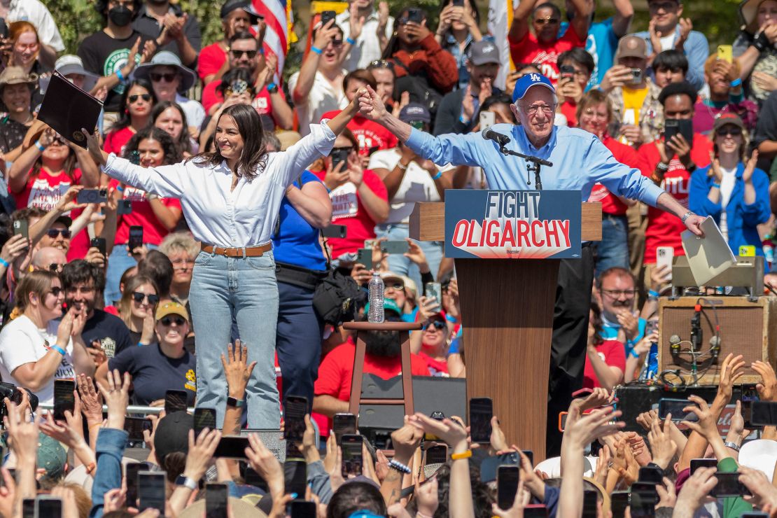 Rep. Alexandria Ocasio-Cortez and Sen. Bernie Sanders hold a