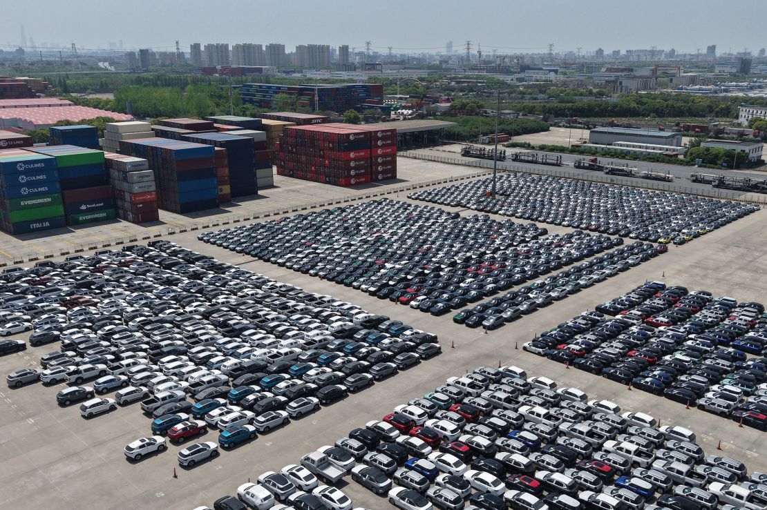 Electric vehicles await export at a dock in Shanghai Port on April 27.
