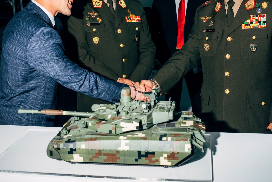 Peruvian delegation at the stand of UkrOboronProm. The Oplot-M main battle tank was offered during the expo as a potential solution to replace the old Soviet T 55 MBT of the Peruvian Army. SITDEF, Lima, Peru, 2019