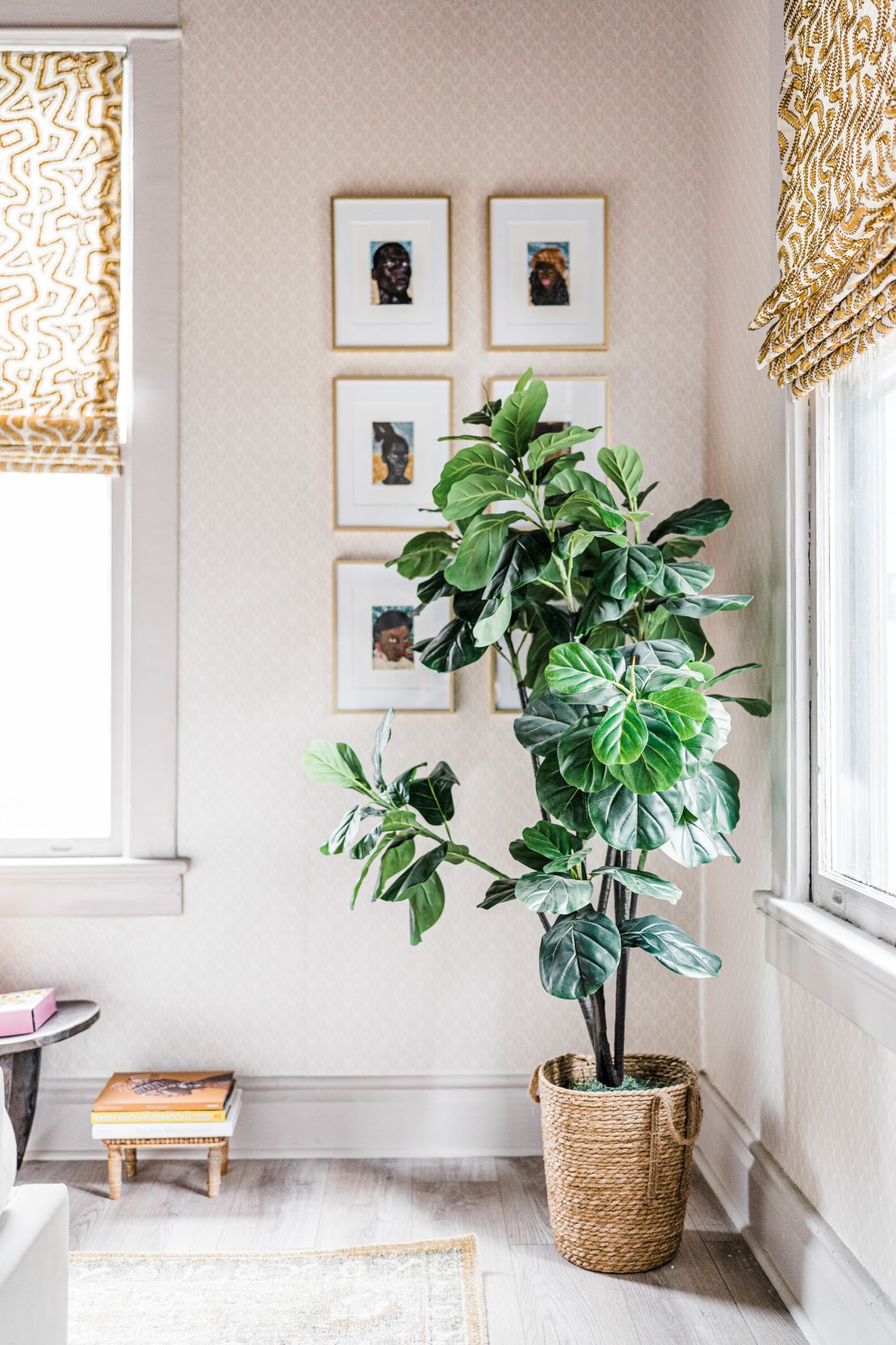 Adding a wood element can be as simple as incorporating a houseplant, such as this fiddle leaf fig, into your decor.