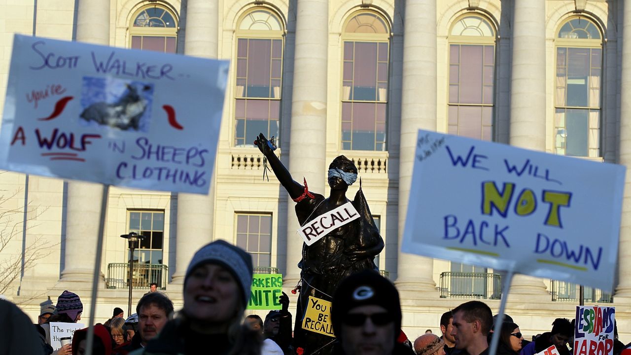 Wisconsinites protest outside the State Capitol in March over the loss of bargaining rights for public union workers.