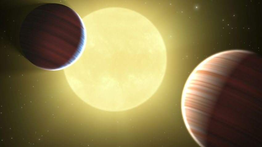 This artist rendition obtained from NASA shows planets the size of Saturn orbiting a distant star. Astrophysicists using the Kepler space telescope have detected two planets the size of Saturn and a possible third the size of Earth orbiting a distant star, a report published August 26, 2010, said.