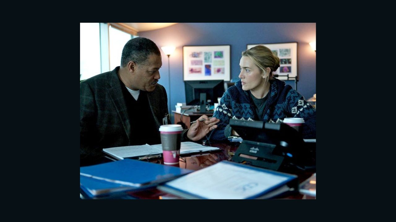 Laurence Fishburn and Kate Winslet in a scene from the Warner Bros. movie "Contagion."