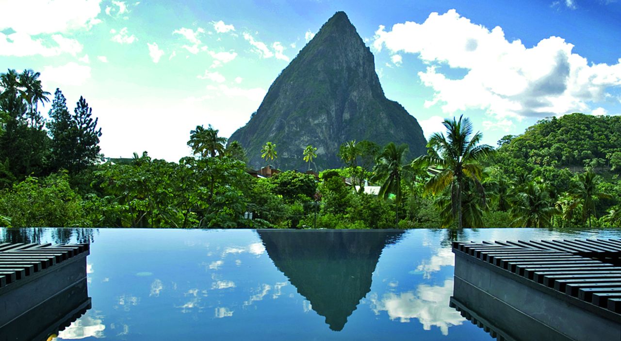 Hotel Chocolat's pool reflects the iconic Pitons and surrounding rain forest in Soufrière, St. Lucia like an overflowing mirror. See more photos on <a href="http://www.budgettravel.com/slideshow/photos-worlds-most-amazing-hotel-pools,6271/" target="_blank" target="_blank">BudgetTravel.com</a>.