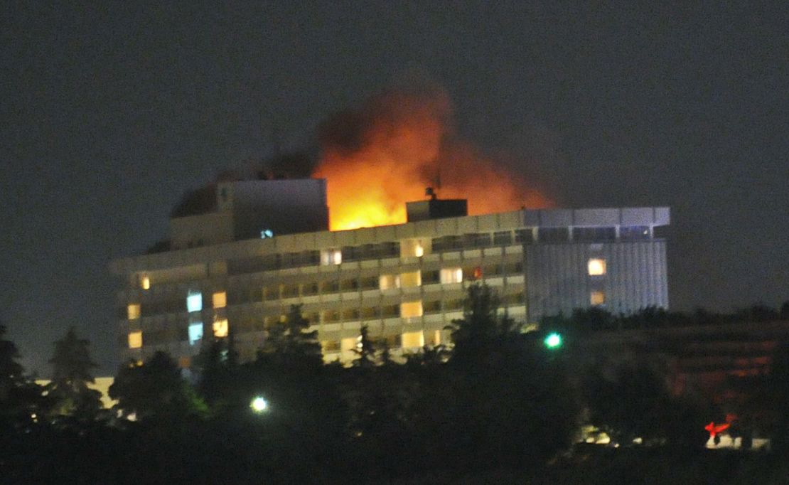 Flames light up the sky after the Kabul Intercontinental Hotel was attacked in 2011.