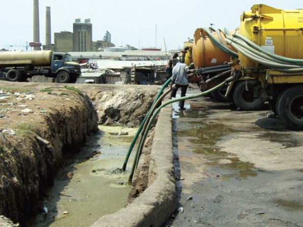 Sewage, collected from household septic tanks, is deposited in the Lagos lagoon