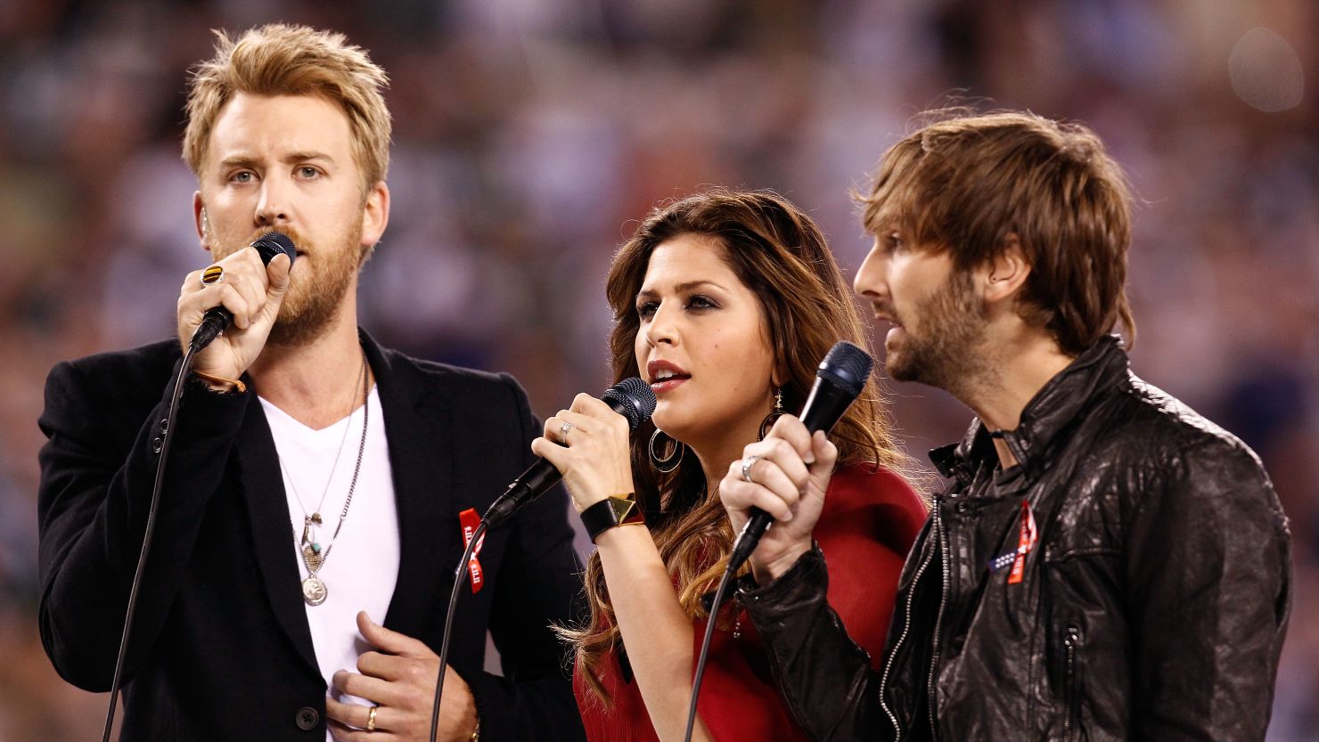 "Helping rebuild this community is our biggest priority right now," Lady Antebellum's Hillary Scott (center) said.