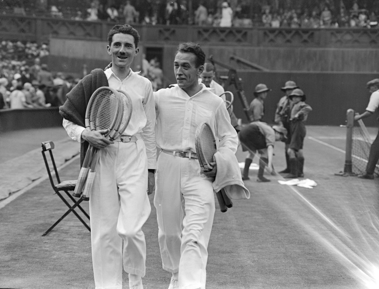 Brugnon, left, was a double specialist who never won a singles grand slam. He and Cochet leave the court after beating Americans Vincent Richards and Howard Kinsey in the 1926 Wimbledon final.