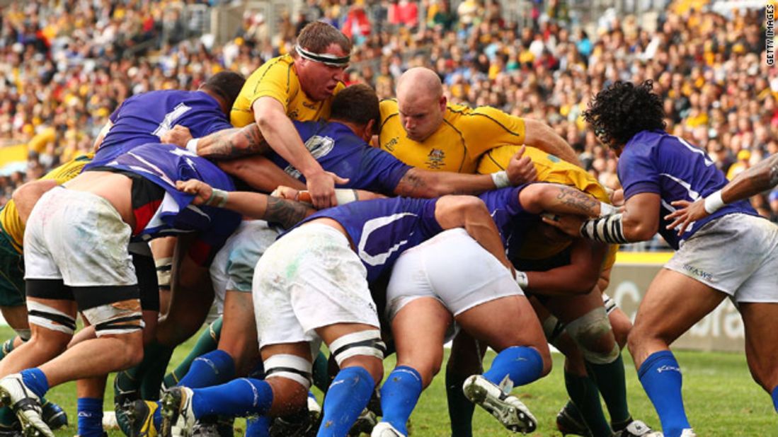 A scrum pops up between Australian and Samoan forwards. The dark arts of the scrum are a mystery for most -- it's a place where biting,  gouging and dirty tricks can go unnoticed by referees. 