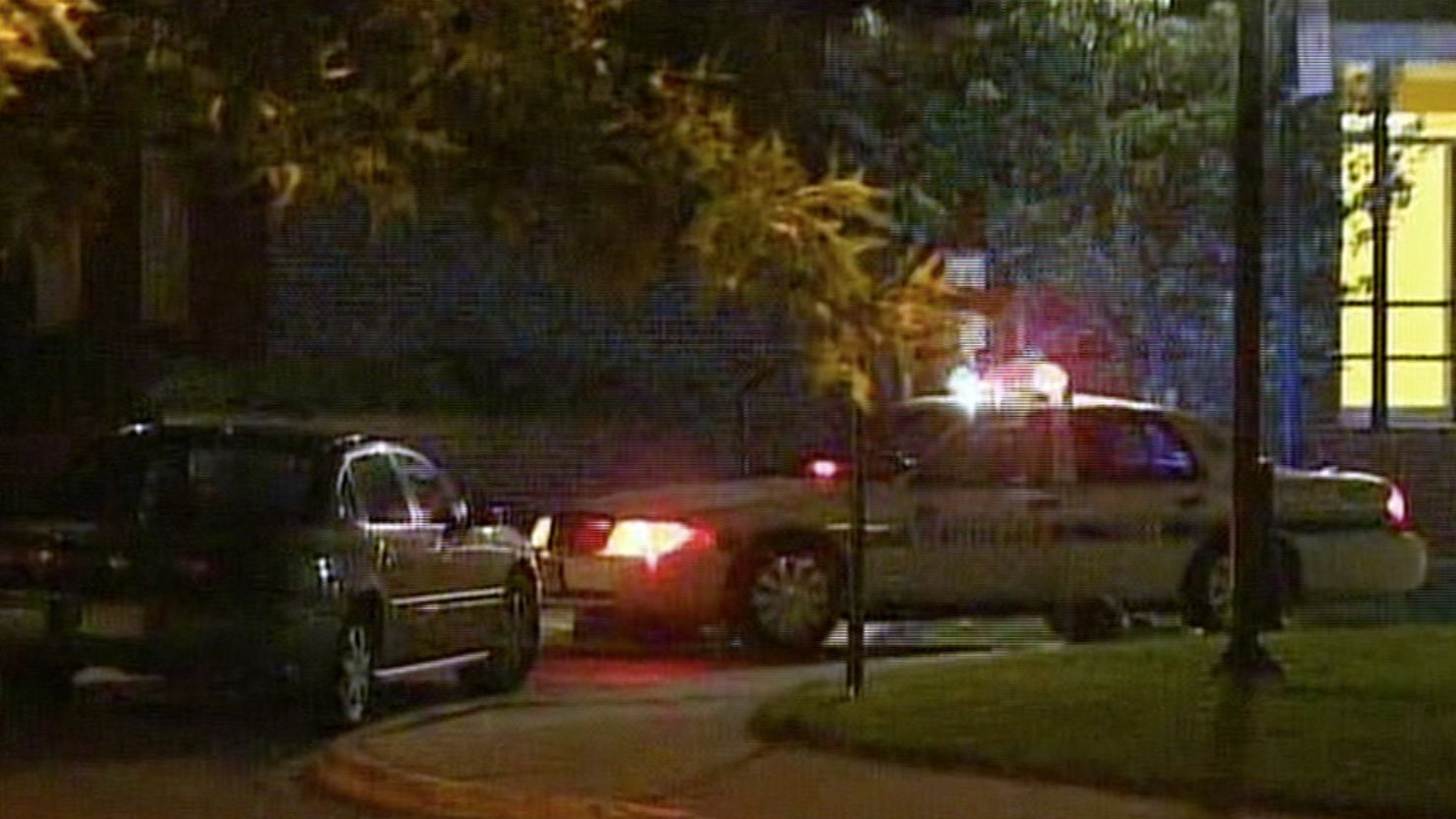 Police apparently investigate the stabbing in this picture from WJLA video.
