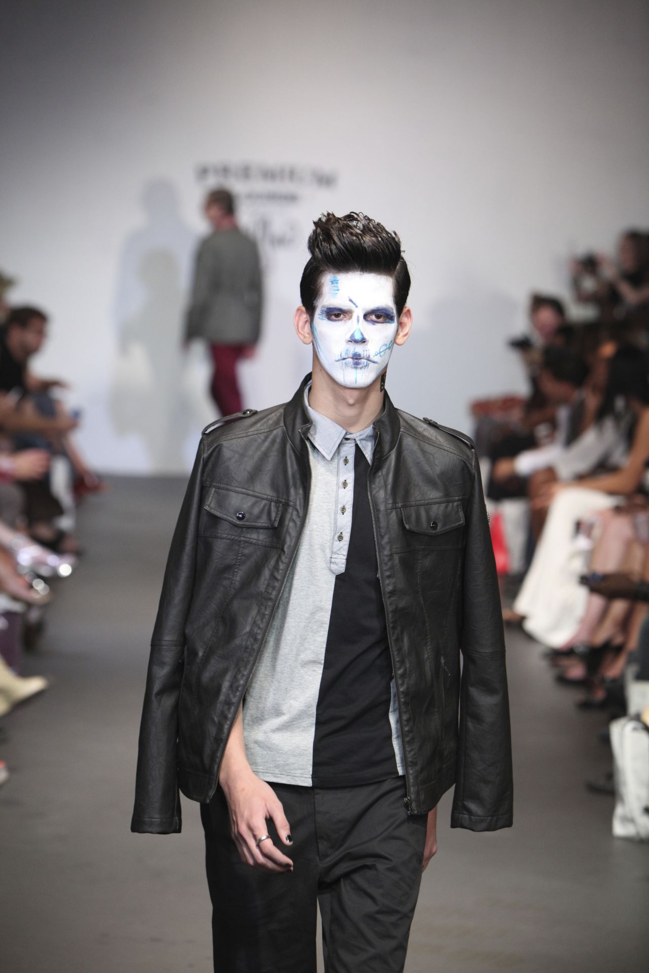 A model makes his way down the runway at the Indashio Spring 2012 fashion show.