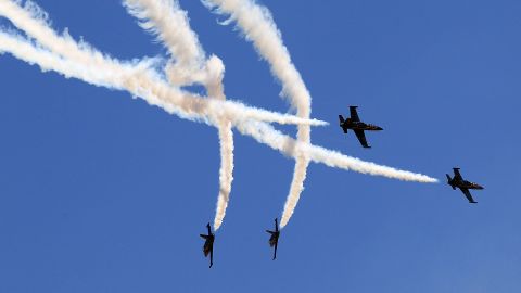 Pilots perform during an air show before an IndyCar race in California.