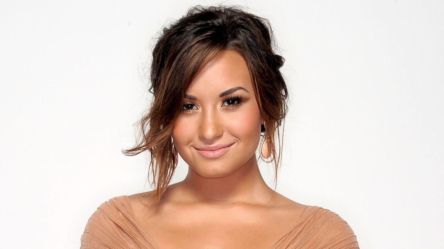 Demi Lovato addresses her issue with cutting on a ballad featured on her new album, "Unbroken" 