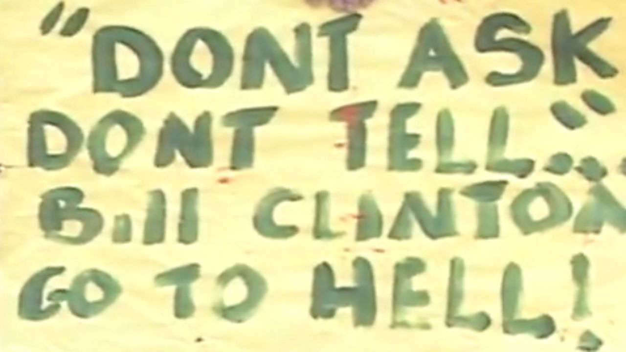 A protester holds up a sign expressing anger at the passage of "Don't Ask, Don't Tell"