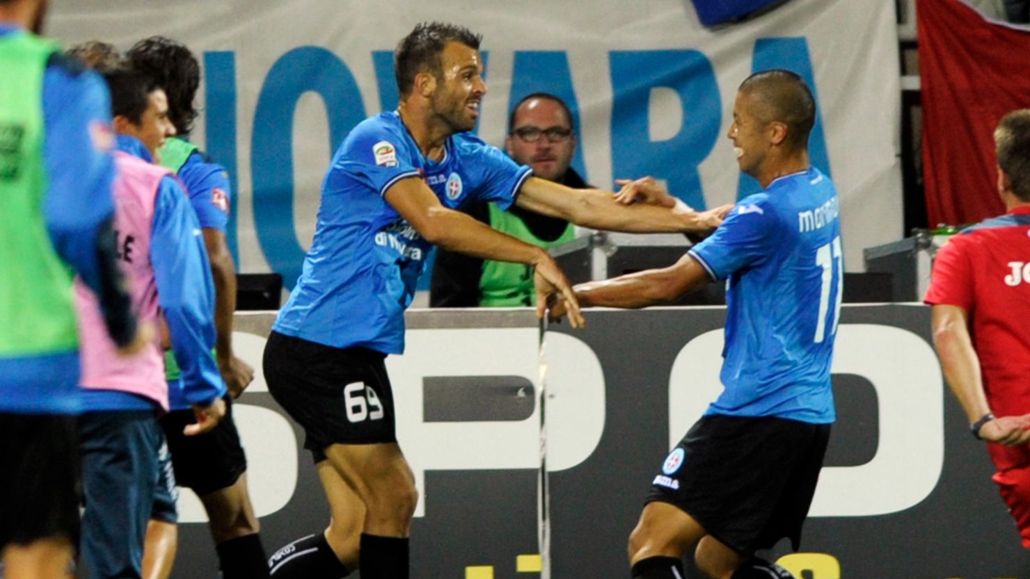 Novara's Riccardo Meggiorin (L) celebrates with Takayuki Morimoto after scoring the opening goal in their 3-1 win over Inter MIlan 