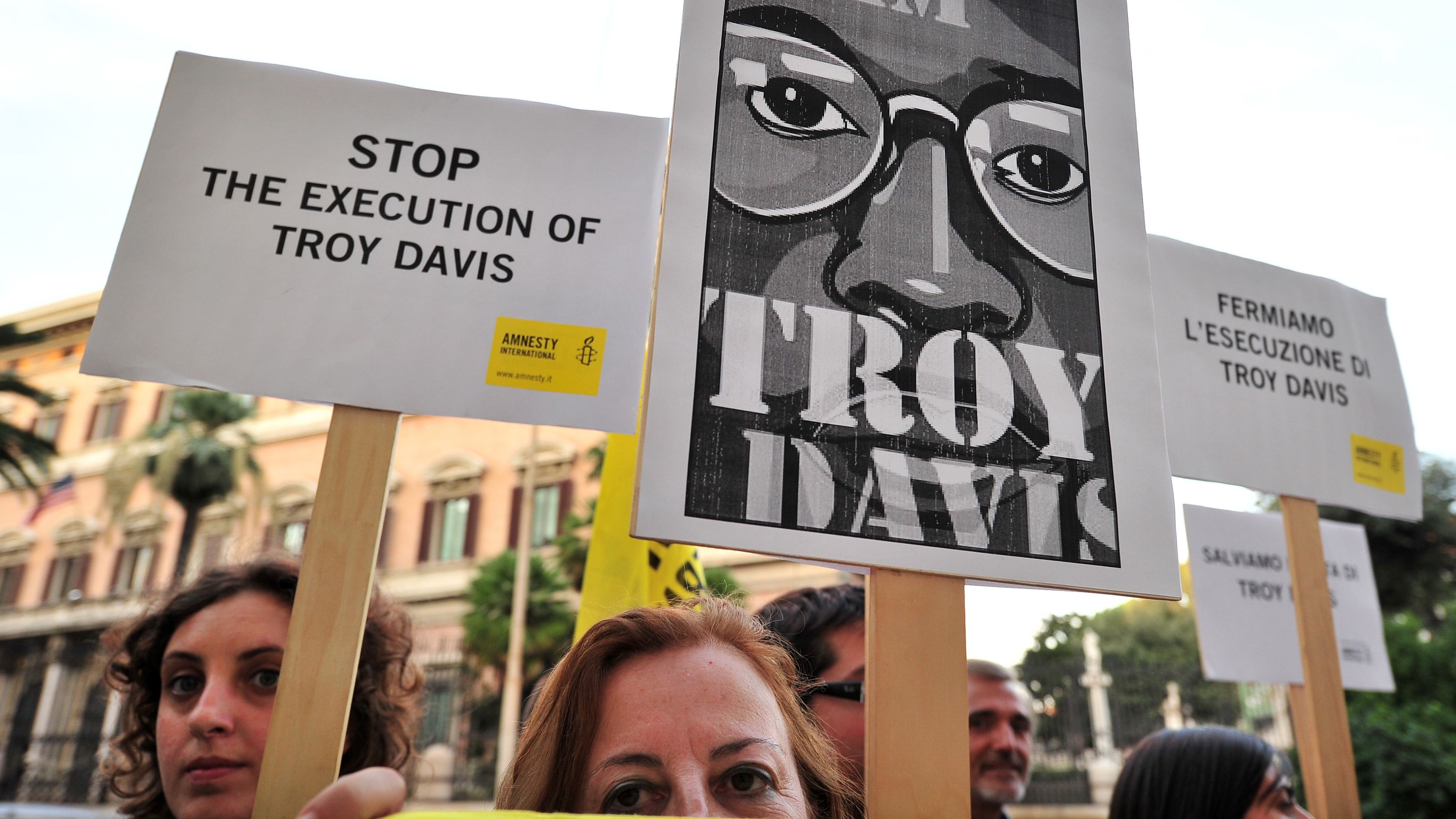 Amnesty International activists hold banners in support of Troy Davis at the U.S. Embassy in Rome on Friday.