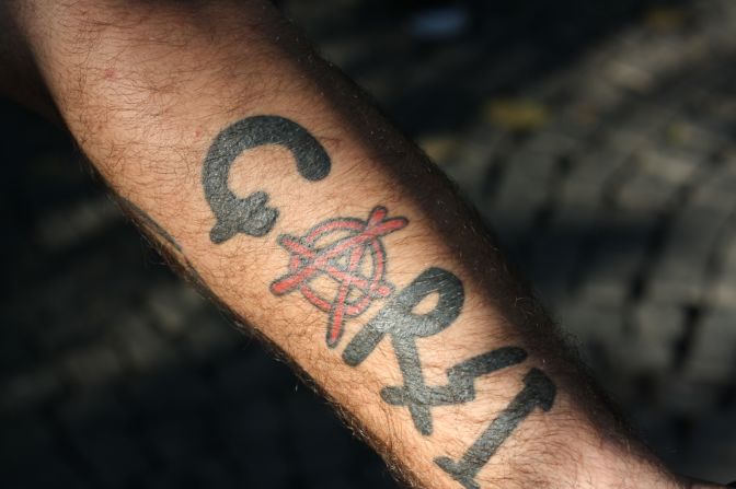 A Besiktas fan shows a tattoo which reads "Carsi" -- the name of the club's most famous supporters' club.
