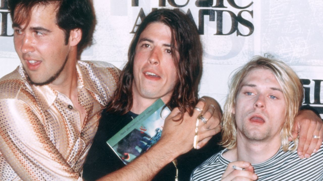 In 1993, from left, Kris Novoselik, Dave Grohl and Kurt Cobain pose with Kevin Kerslake, who directed the video for "In Bloom."