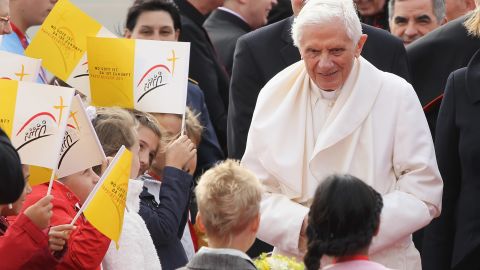 Pope Benedict XVI greets children upon his arrival at Tegel airport in Berlin, Germany. 