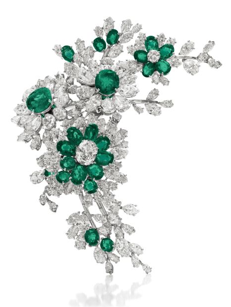 This diamond and emerald Bulgari brooch was one of a suite of dazzling gifts Burton made to Taylor. 