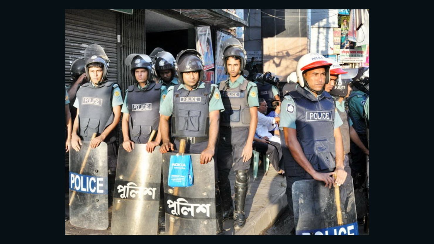A huge contingent of police guard the streets in Bangladeshi capital of Dhaka on Thursday as the opposition parties call a general strike in protest against fuel price hike.