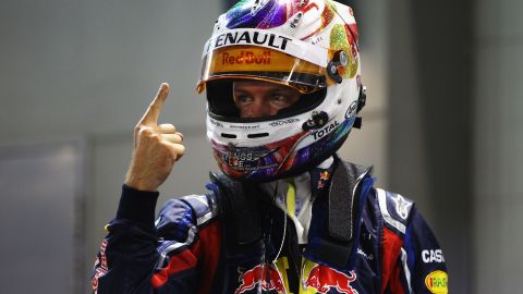 Red Bull driver Sebastian Vettel celebrates after finishing first during qualifying on Saturday.
