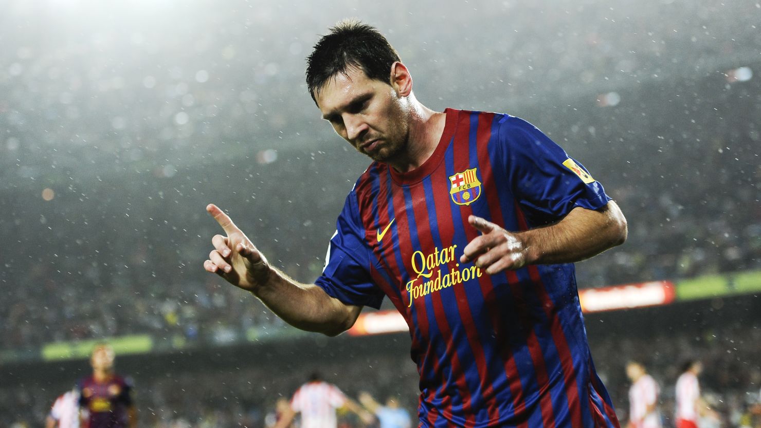 Lionel Messi celebrates after scoring his third goal during Barcaleona's 5-0 win over Atletico Madrid.
