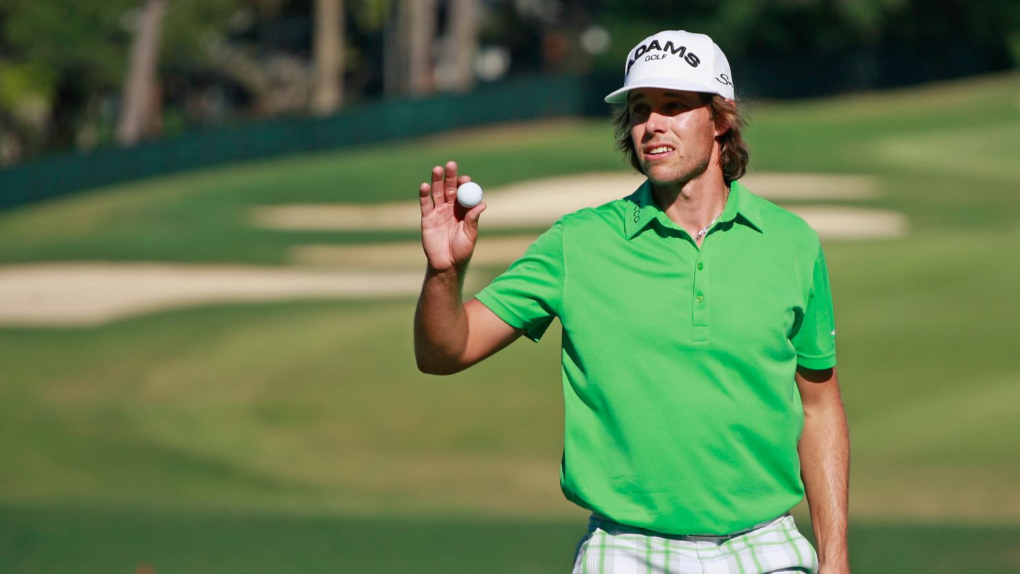 Australia's Aaron Baddeley moved into a share of the Tour Championship lead with a brilliant 64
