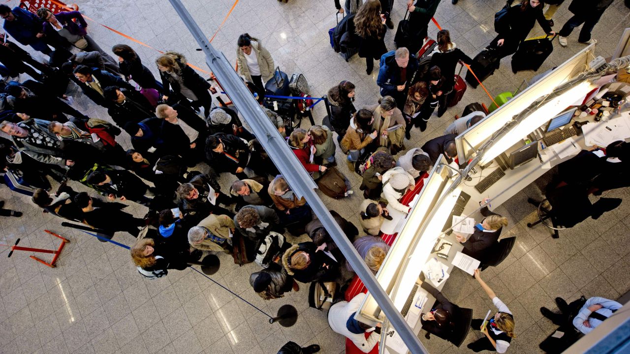 Travellers at Eindhoven Airport on December 24, 2010. Due to heavy snowfall, flights to and from the airport were cancelled. 