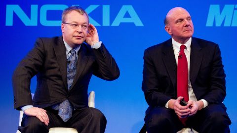 Nokia CEO Stephen Elop, left, with Microsoft CEO Steve Ballmer onstage after announcing their partnership.
